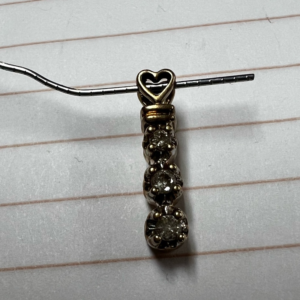 Ladies 10k yellow gold genuine diamond three stone past present future pendant